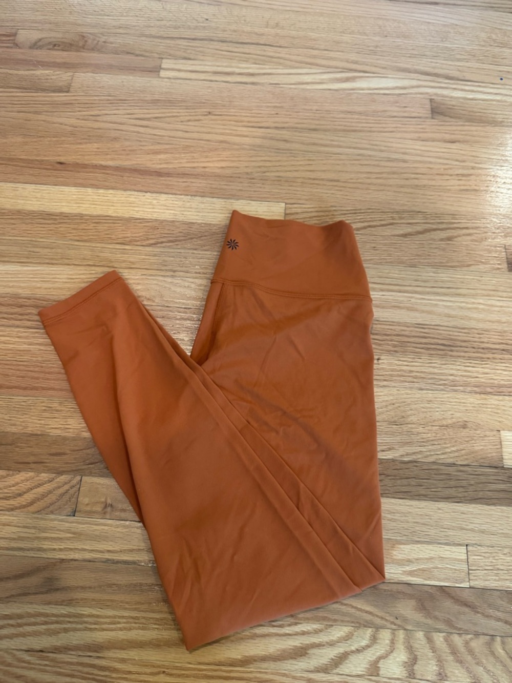 Athleta Transcend tight in Burnt Orange Leggings